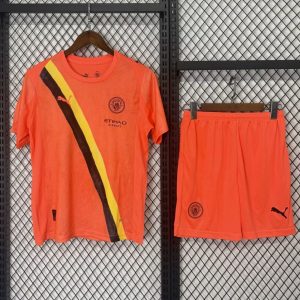25 26 Kids KIDSUPER x MANCHESTER CITY Orange Jersey - Front