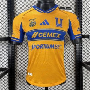 Player Version 25 26 Tigres UANL Gold with Blue Chest Band, 65th Anniversary Badge & Sportiumbet Jersey - Front